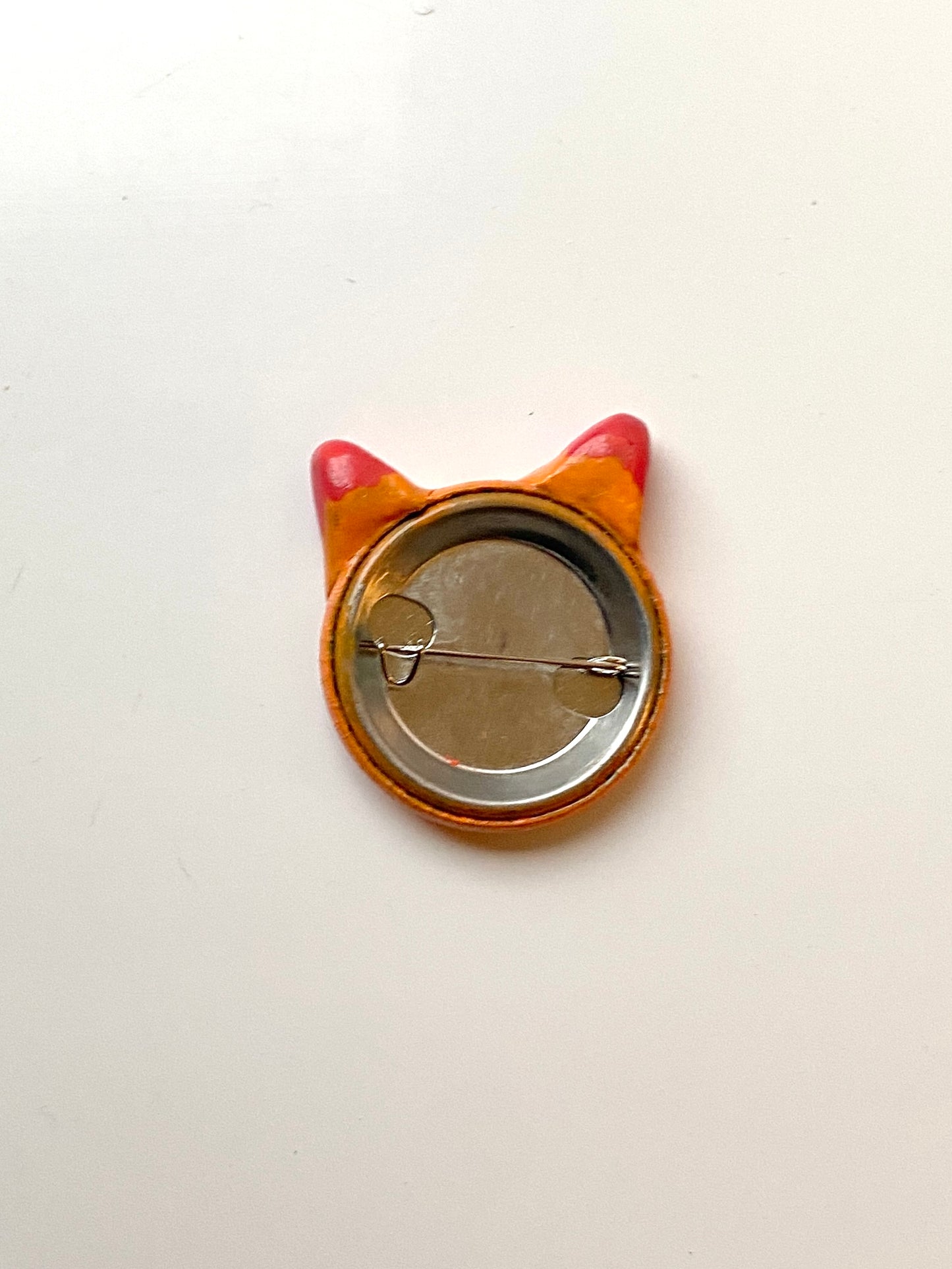 Orange cat badge