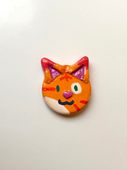 Orange cat badge