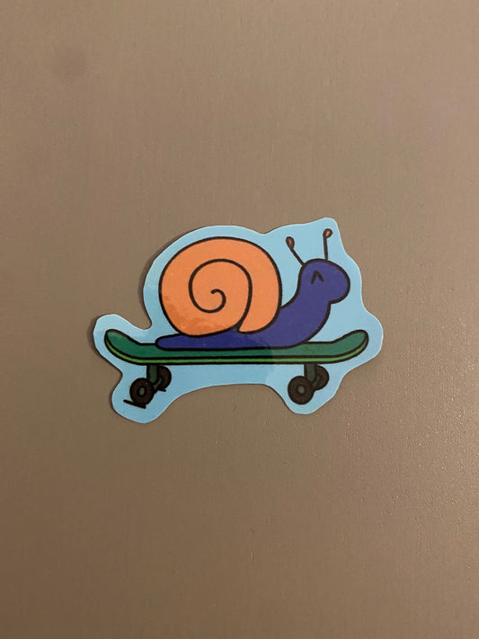 Skateboarding snail sticker