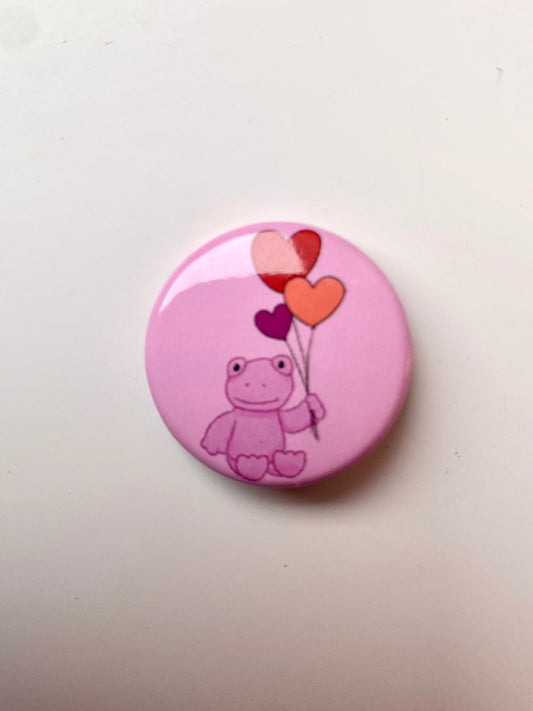 Small pink frog pin badge