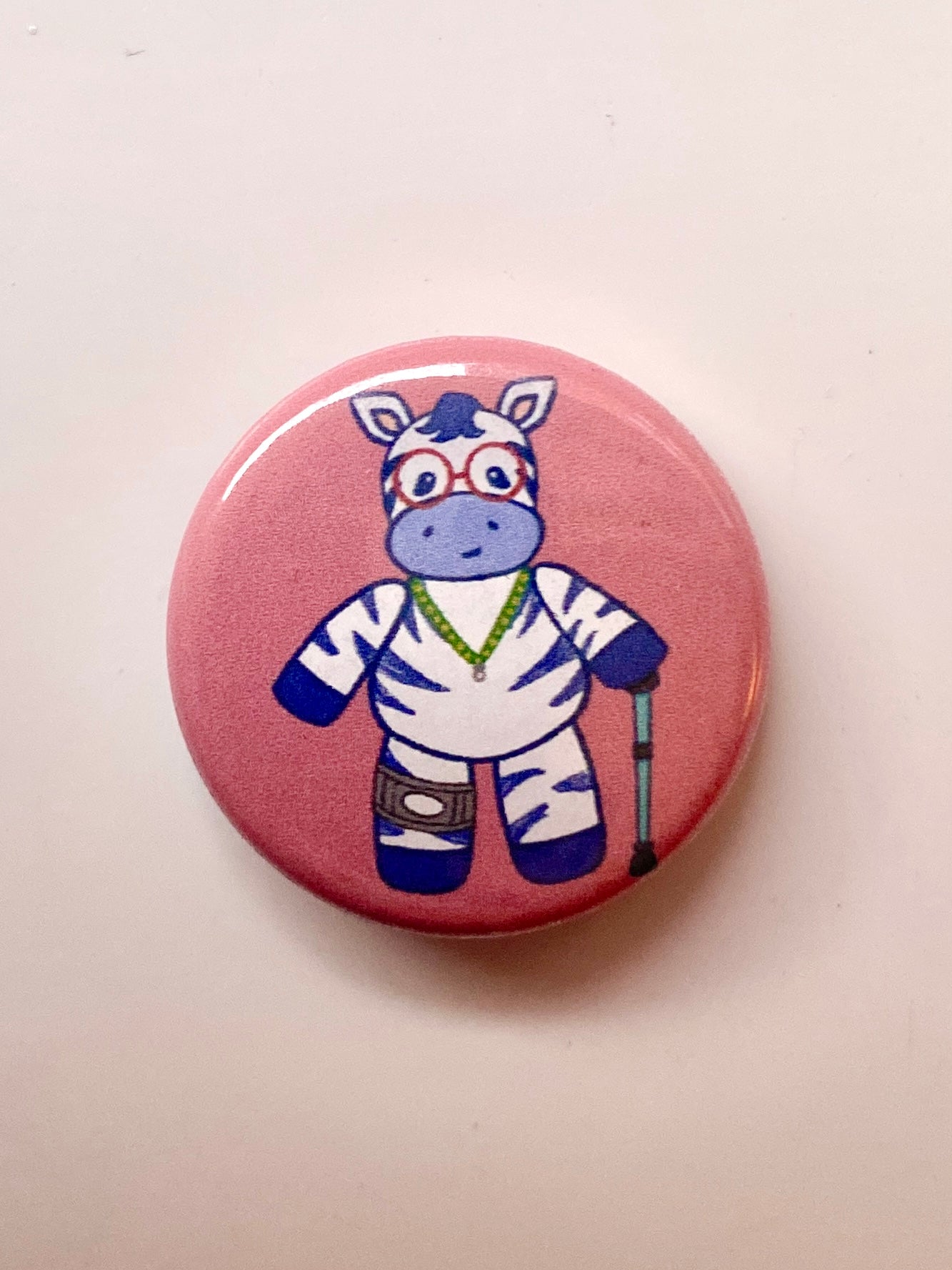 Small EDS Zebra pin badge