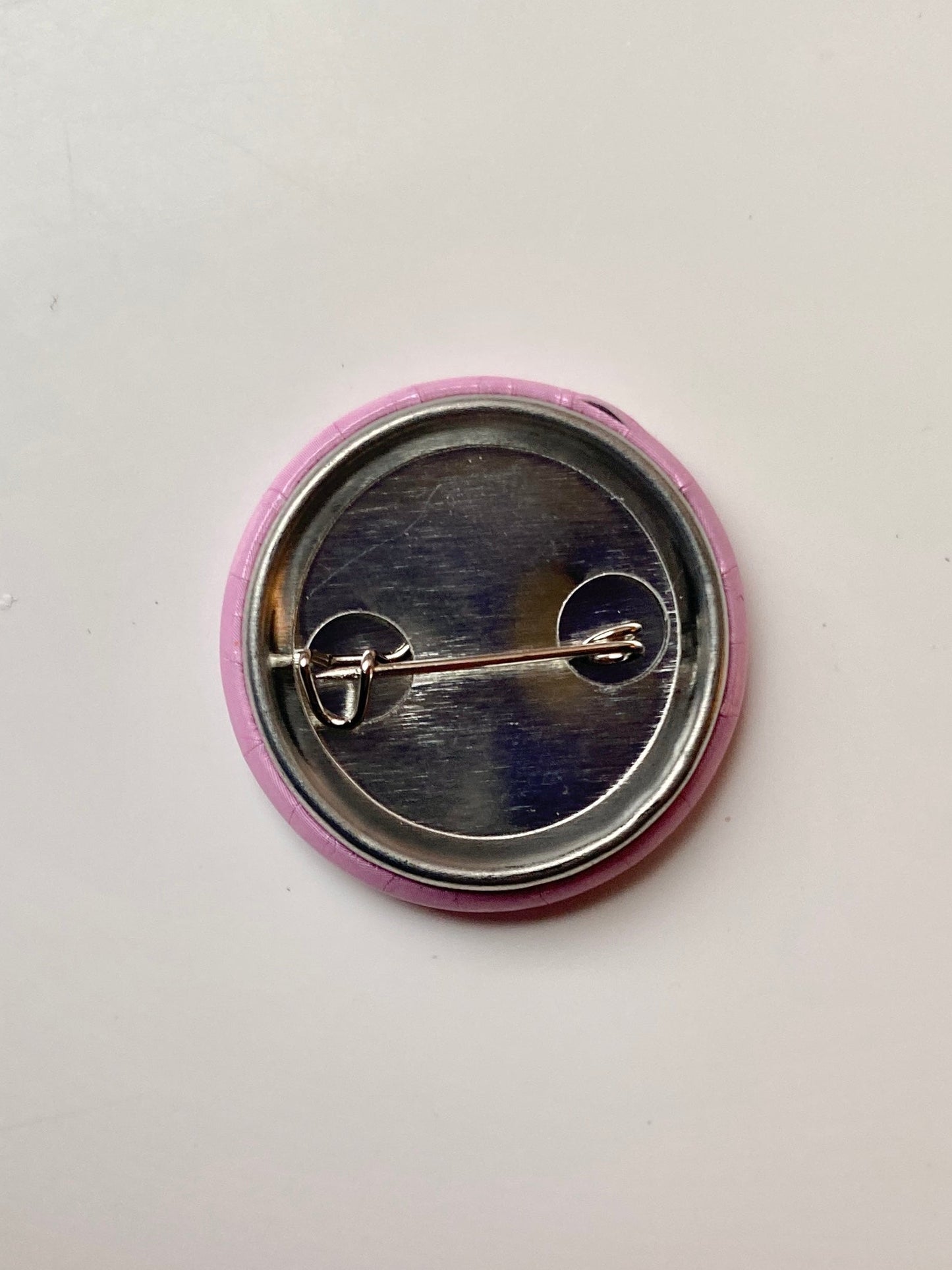 Small pink frog pin badge