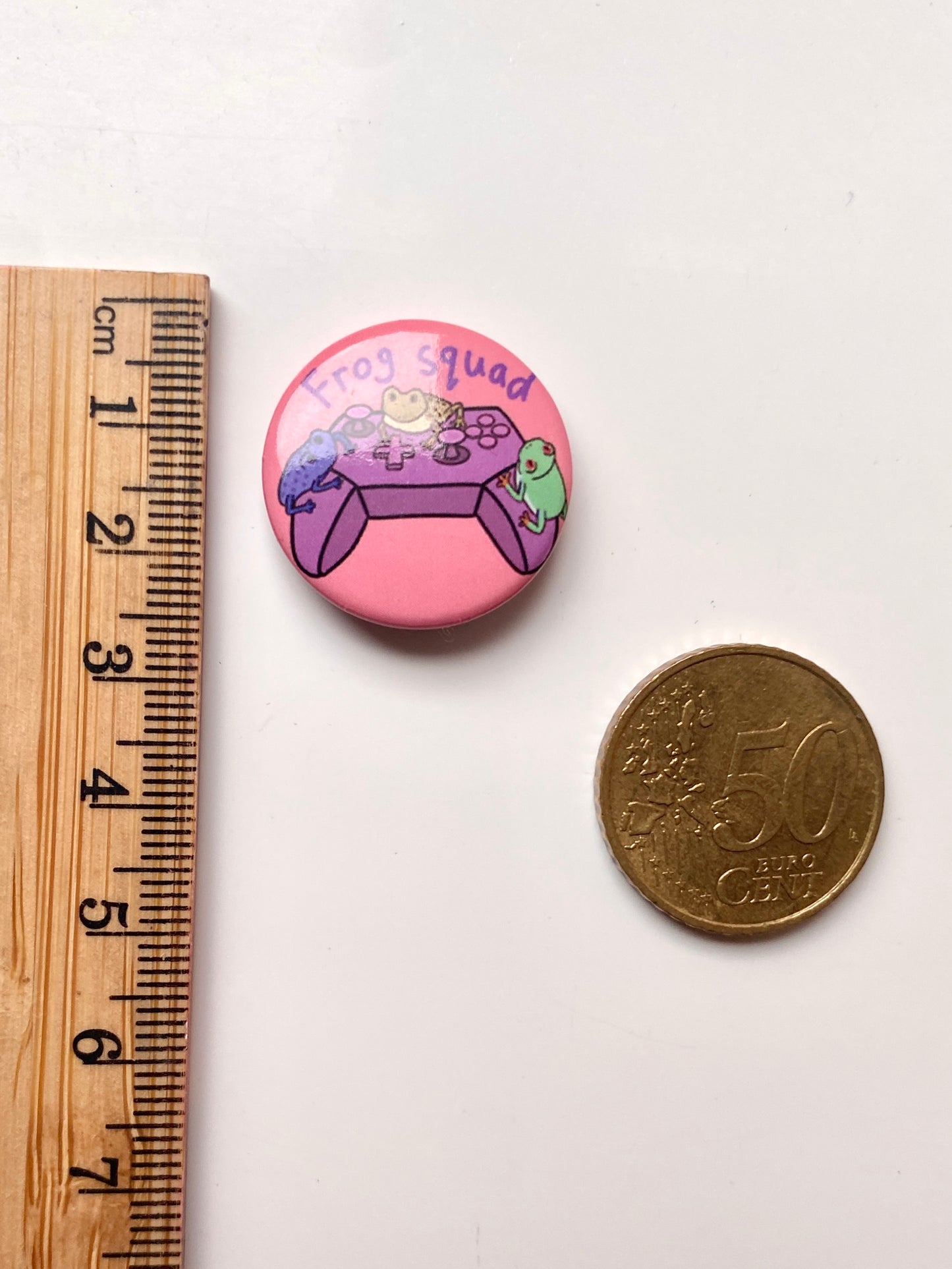 Small frog squad pin badge