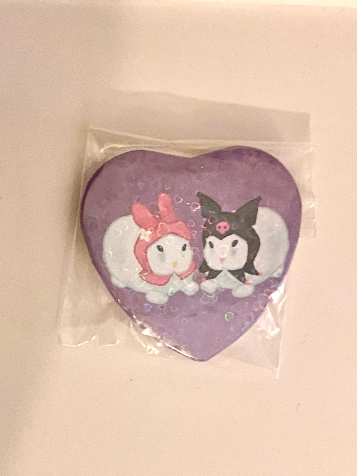 Bunnies heart shaped badge
