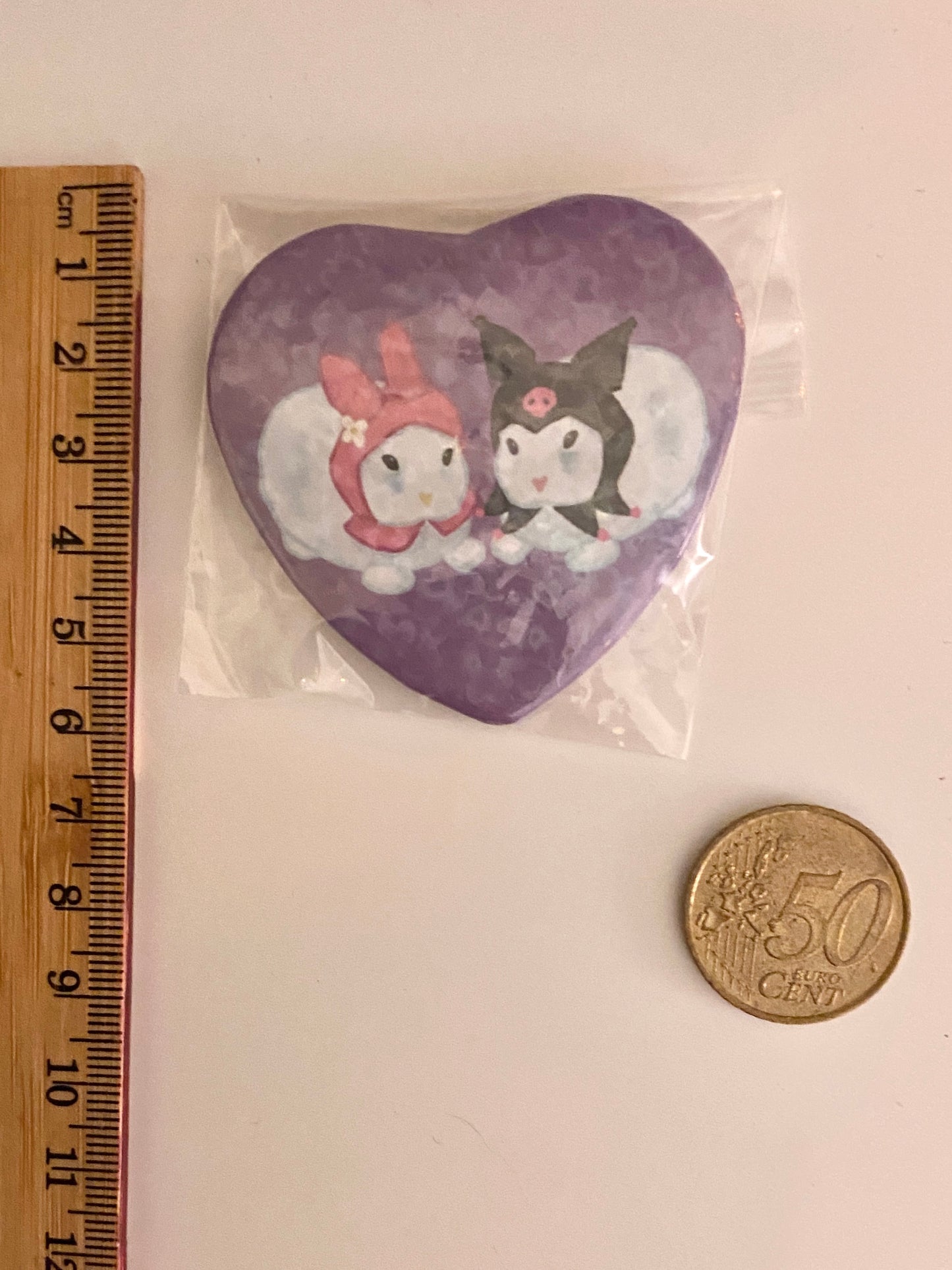 Bunnies heart shaped badge