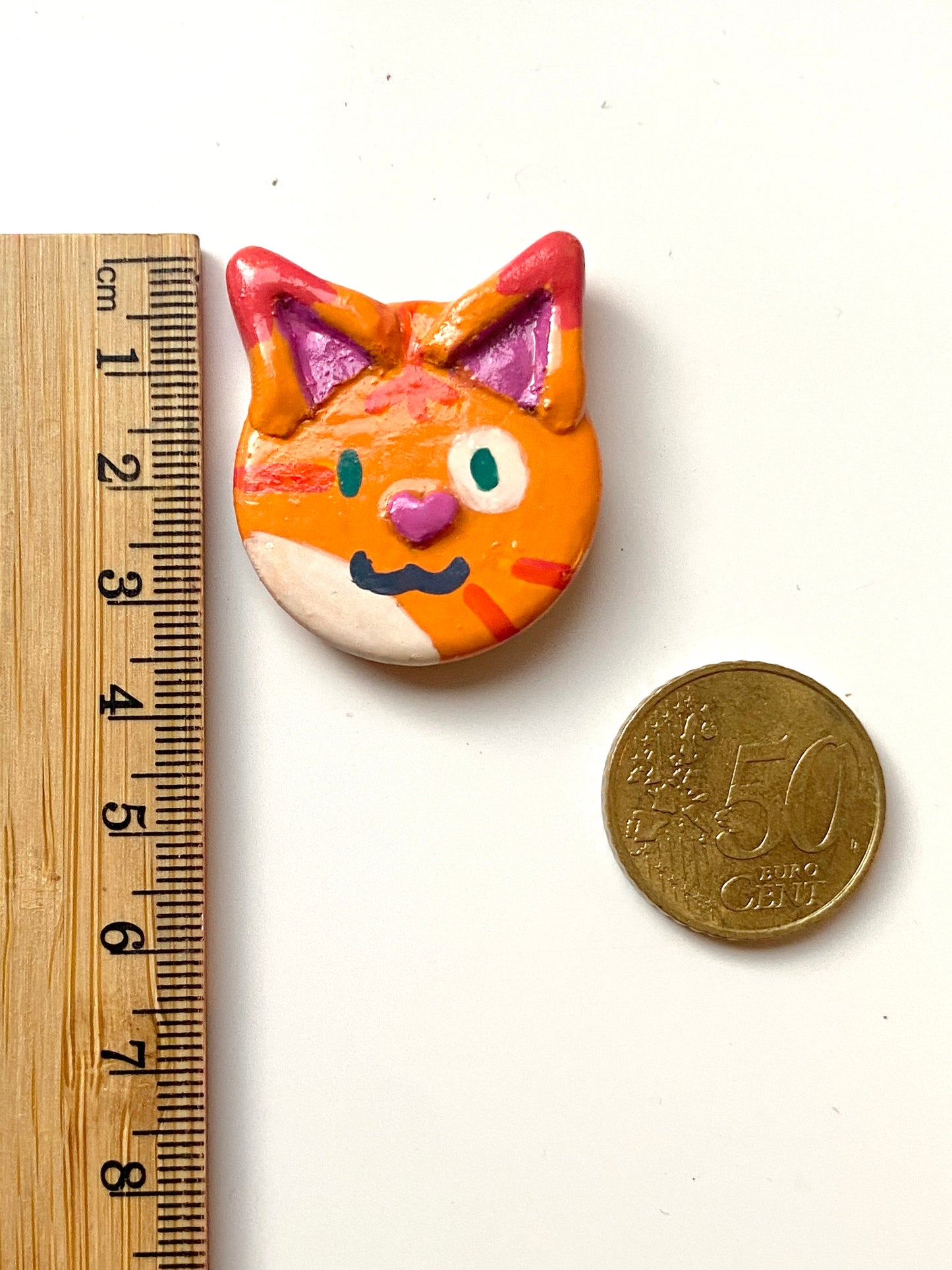 Orange cat badge