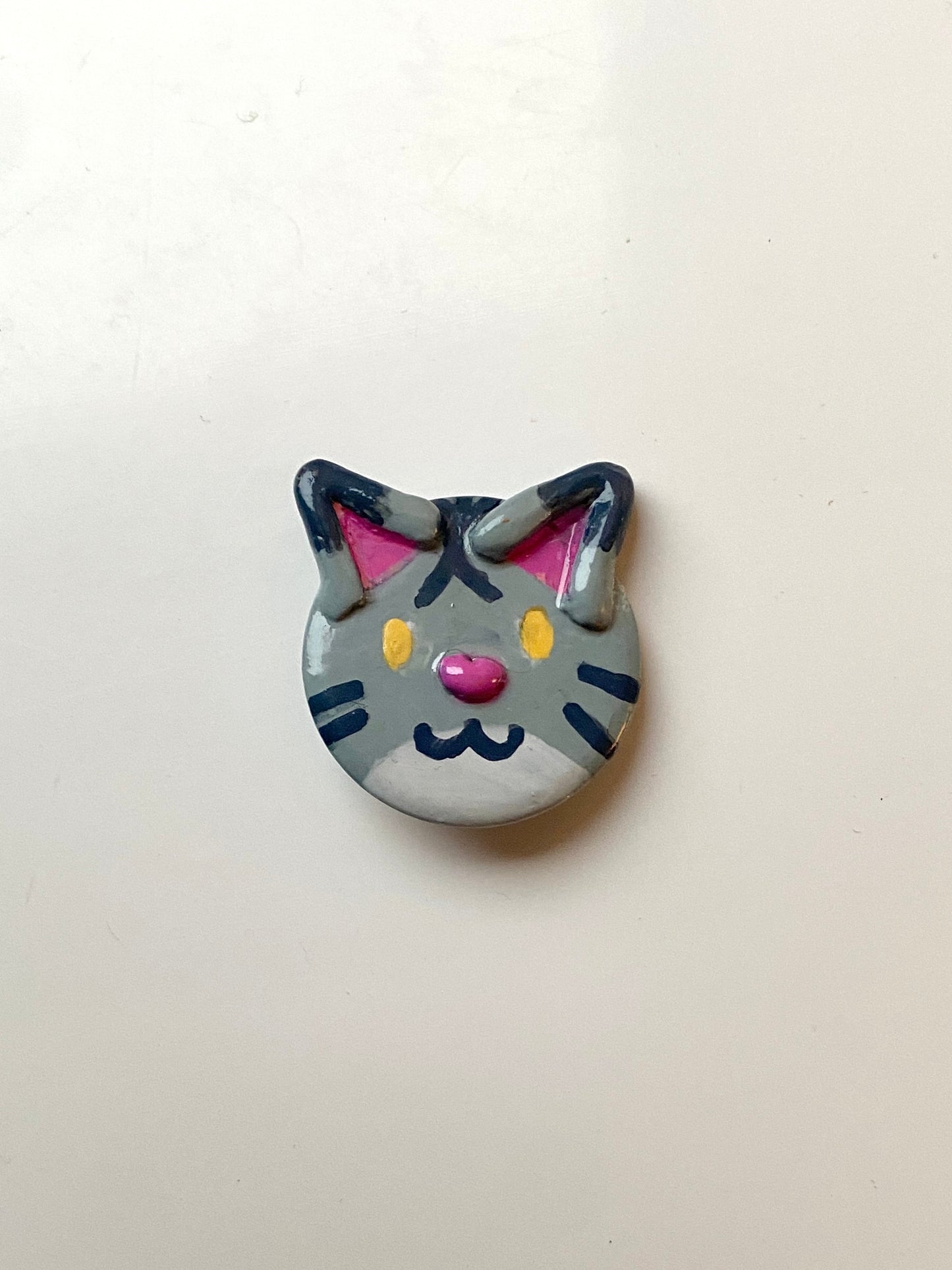 Grey cat badge